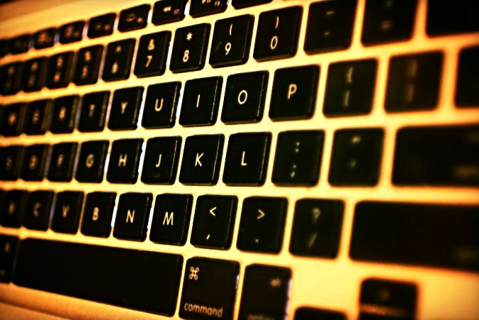 Close-up of a warm-lit keyboard